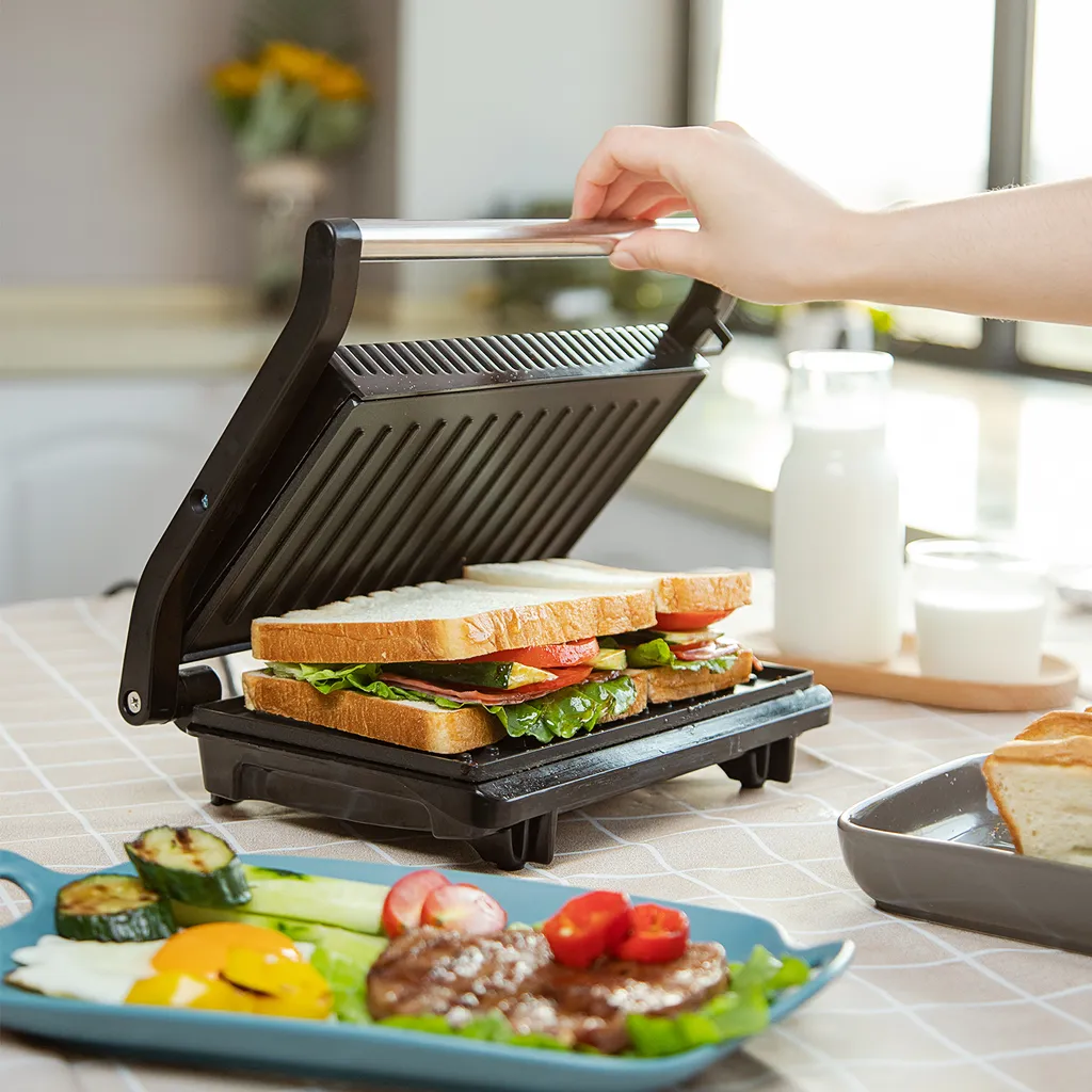 Aigostar York - Sandwichmaker 800W, Grilltoaster, Panini Maker, Cool Touch-Griff, Antihaft-Platten, BPA Frei, Edelstahl, Klein, Lagerfähig, Schwarz 13 Aigostar York - Sandwichmaker 800W, Grilltoaster, Panini Maker, Cool Touch-Griff, Antihaft-Platten, BPA Frei, Edelstahl, Klein, Lagerfähig, Schwarz – Bild 11