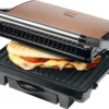 Bestron Elektrischer Kontaktgrill Mit Auffangschale, Sandwichmaker Mit Cool-Touch-Handgriff & Antihaftbeschichtung, Paninimaker Mit 1000 Watt, ASW113CO, Farbe: Kupfer 1 Bestron Elektrischer Kontaktgrill Mit Auffangschale, Sandwichmaker Mit Cool-Touch-Handgriff & Antihaftbeschichtung, Paninimaker Mit 1000 Watt, ASW113CO, Farbe: Kupfer -Tepro Verkäufe 2024 34d83b13c65215c667afb49653b23912