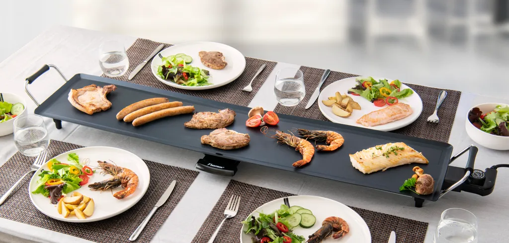 Bestron Elektrische XXXL Plancha-/Teppanyaki-Grillplatte Mit Antihaftbeschichtung, Grillspaß Für Bis Zu 10 Personen, Extra Lange Grillfläche, 2.000 Watt, Farbe; Schwarz 4 Bestron Elektrische XXXL Plancha-/Teppanyaki-Grillplatte Mit Antihaftbeschichtung, Grillspaß Für Bis Zu 10 Personen, Extra Lange Grillfläche, 2.000 Watt, Farbe; Schwarz – Bild 2