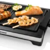 Bestron Elektrischer Tischgrill, Teppanyaki Mit Herausnehmbarer Grillplatte & Zwei Grilloberflächen, Antihaftbeschichtet, 2.000 Watt, Schwarz/Silber 2 Bestron Elektrischer Tischgrill, Teppanyaki Mit Herausnehmbarer Grillplatte & Zwei Grilloberflächen, Antihaftbeschichtet, 2.000 Watt, Schwarz/Silber -Tepro Verkäufe 2024 507daf4fe230ce0b9ff261216a2688b7