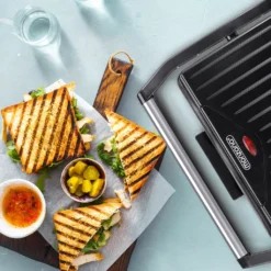 Monzana Kontaktgrill Antihaftbeschichtete Grillplatten Herausnehmbare Auffangschale Cool-Touch-Griff 1500 W Panini Toaster Grill Sandwichmaker Schwarz -Tepro Verkäufe 2024 997c3a9276ac4f54c39339d8cc85a40b