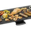 Bestron Elektrischer Tischgrill, XXL Plancha-/Teppanyaki-Grillplatte Mit Antihaftbeschichtung, Grillspaß Für Bis Zu 8 Personen, Extra Lange Grillfläche, 1.800 Watt, Farbe; Schwarz 2 Bestron Elektrischer Tischgrill, XXL Plancha-/Teppanyaki-Grillplatte Mit Antihaftbeschichtung, Grillspaß Für Bis Zu 8 Personen, Extra Lange Grillfläche, 1.800 Watt, Farbe; Schwarz -Tepro Verkäufe 2024 a205d0008248c6ec1dfc3ca145d6df55